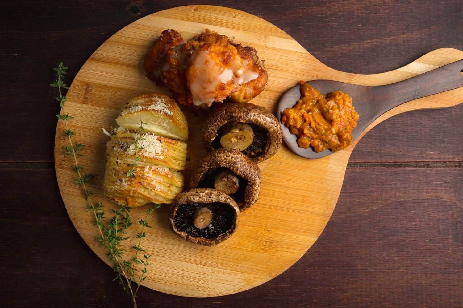 Grilled Portabello Mushroom, Hasselback Potato, Pumpkin Fritters & Chakalaka
