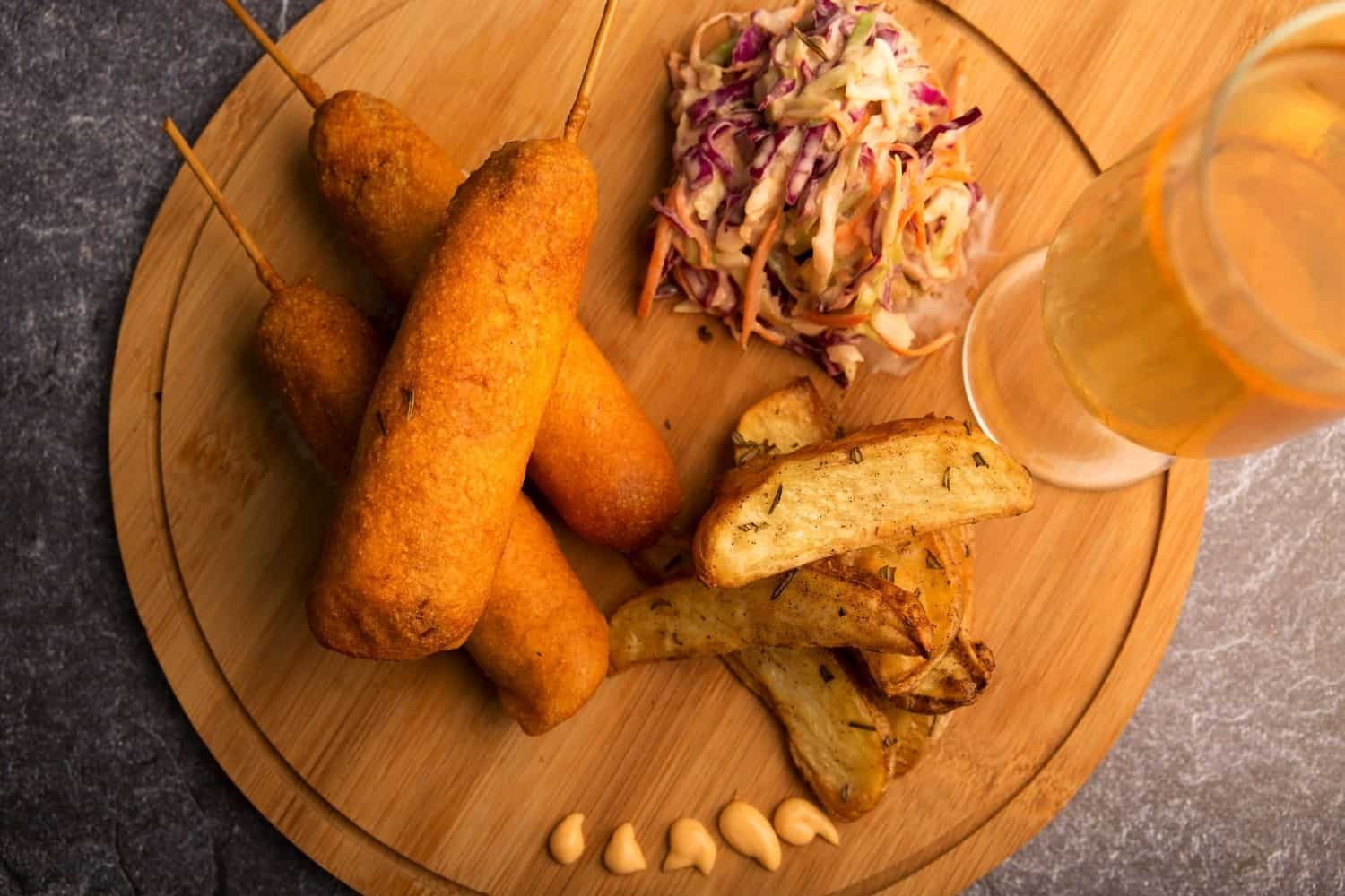 Vegan Corn Dog with Potato Wedges & Crunchy Slaw