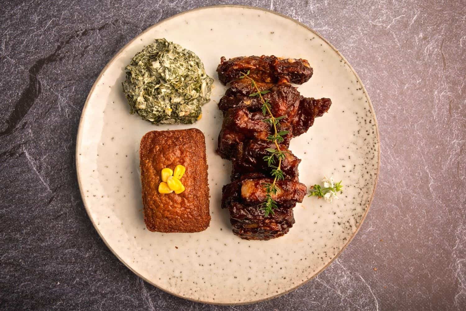 Slow braised beef short rib, homemade BBQ sauce, corn bread and creamed spinach
